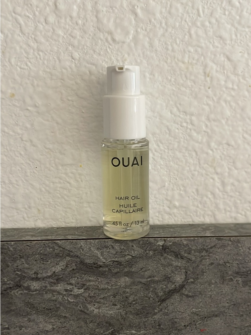 OUAI Hair Oil Serum in Clear Bottle with White Cap